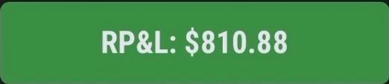 A realised profit and loss badge reading $810.88